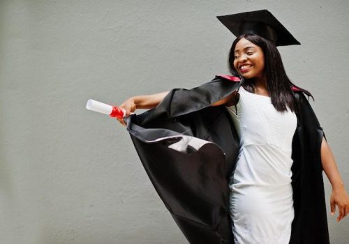 young-female-african-american-student-with-diploma-poses-outdoorsxa_627829-4038_jpg_75